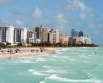 El Gobierno recusó a camarista que recibió de Clarín un viaje a Miami.